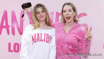 Katherine Ryan transforms into Regina George's mum as she sports ICONIC pink tracksuit while joining daughter Violet, 15, at Mean Girls: The Musical opening night at The Savoy