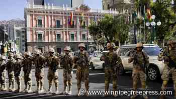 Bolivian president warns “irregular” military deployment under way in capital, raising coup fears