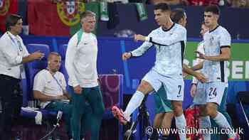 Cristiano Ronaldo kicks the turf in anger as he is substituted early during Portugal's shock Euro 2024 defeat by Georgia... having been booked for protesting penalty call earlier on in tie