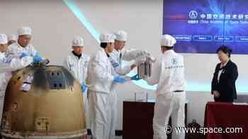 China opens Chang'e 6 return capsule containing samples from moon's far side (video)
