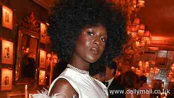Jodie Turner-Smith looks incredible in a white thigh-split dress and feathers as she joins a glam Marisa Abela at star-studded Harry's Bar party