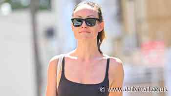 Olivia Wilde flaunts her fit figure in a tiny sports bra and leggings after working up a sweat at an LA gym
