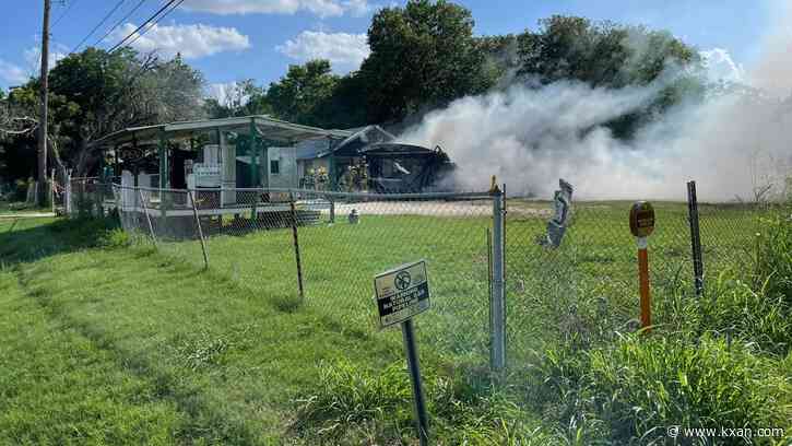 Officials responding to house fire near US 183