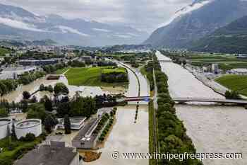 Storms in Switzerland cause flooding and a landslide that left at least 2 people dead