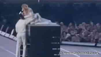 Taylor Swift is CARRIED OFF of platform on stage after mechanical glitch at Saturday's Dublin concert