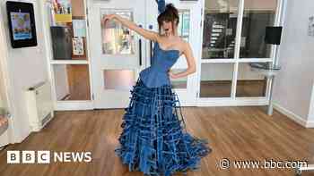 Broken classroom blinds make perfect dress for fashion student