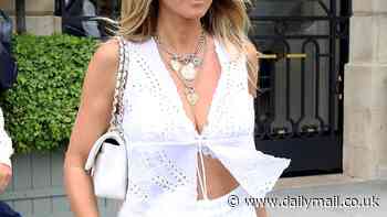 Heidi Klum, 51, flashes her toned midriff and cleavage in plunging white top as she leaves Ritz hotel in Paris with her husband Tom Kaulitz, 34, and his identical twin brother Bill