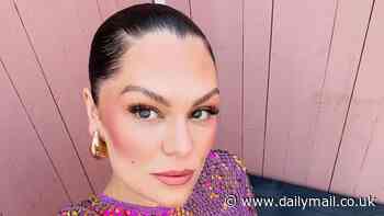 Jessie J hints she is 'going through something personal' as she shares an album of sparkly snaps ahead of her gig in Sweden