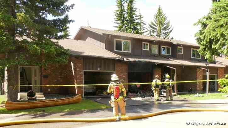 Garage fire threatens home in Palliser