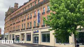 Hotel opening marks milestone in city's revamp
