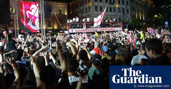 Georgia given heroes' welcome on return from Euro 2024 – video