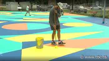 Outdoor basketball court in Winnipeg's inner city gets colourful makeover