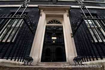 Who else lives in Downing Street apart from the prime minister?
