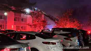 2 people taken to hospital after apartment complex fire in New London
