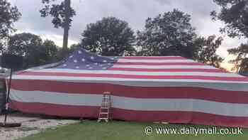 America's most patriotic family? Father and son drape entire house with American flag for July 4th