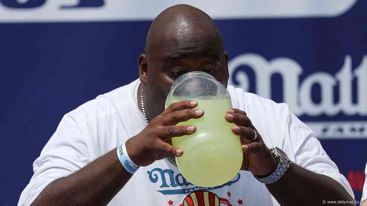 Eric 'Badlands' Booker smashes the world record for a lemonade chug at ...