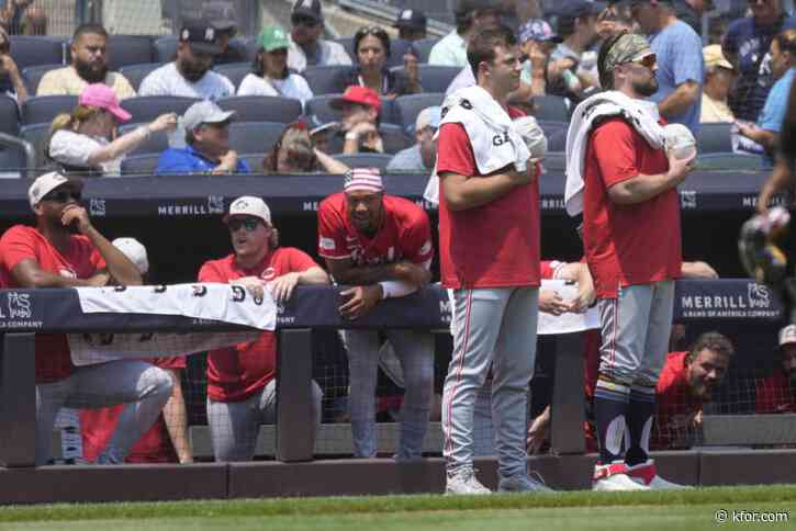 Reds, Yankees players have 5-minute stare-down after national anthem: 'A little competition within the game'