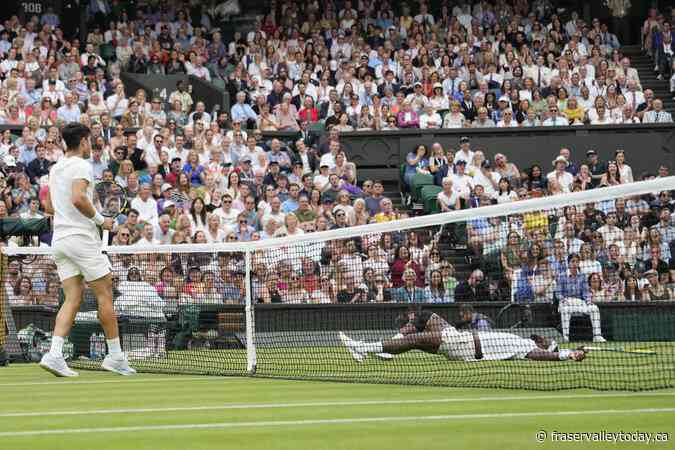 Defending Wimbledon champion Carlos Alcaraz comes back to beat Frances Tiafoe in the third round