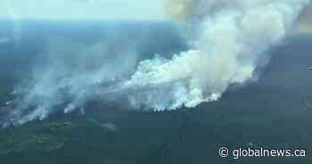 Suncor cuts production as wildfire burns out of control near oilsands site