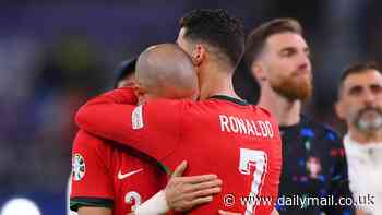 Cristiano Ronaldo consoles an emotional Pepe after Portugal's Euro 2024 defeat by France as the veterans bow out of the competition with loss on penalties