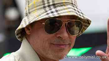 Brad Pitt makes a fashion statement at Silverstone in a £320 Burberry bucket hat to film scenes for his new Formula 1 film at the British Grand Prix