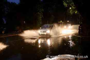 City streets flooded as heavy rain batters Merseyside
