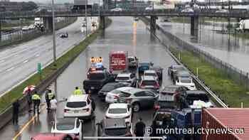 Record-breaking rainfall wreaks havoc on Montreal roads