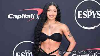 Rapper GloRilla flashes her VERY taut tummy in a sexy black gown at 2024 ESPY Awards