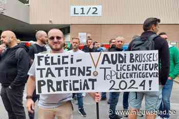 Verslagen werknemers verzamelen aan poort Audi Brussel: “Van de ene dag op de andere zijn we niet meer welkom in de fabriek”