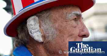 Trump fans wear bandages on ears to show support – in pictures