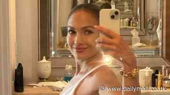 Jennifer Lopez shares optimistic message while posing for glamorous selfies in bed amid rumored marriage woes: 'Today is gonna be a great day'