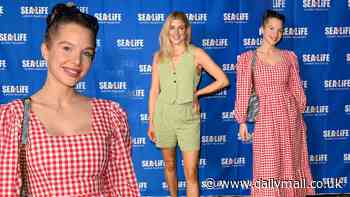 Helen Flanagan looks radiant in a red gingham dress as she joins leggy Ashley James at Sea Life Aquarium launch