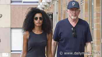 Boris Becker cuts a smart casual figure in a navy blue T-shirt as he steps out with his glamorous fiancé Lilian De Carvalho Monteiro