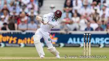 Watch that roof! West Indies No 11 Shamar Joseph is a nuisance for England fans as his effort causes tiles on roof of pub at Trent Bridge to fall down