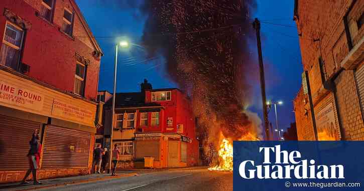 Police car turned over and vehicles set alight in disorder in Leeds