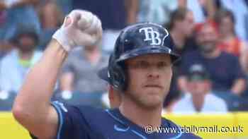 Rays' Taylor Walls reenacts Donald Trump's famed 'Fight! Fight! Fight!' chant after double... but Cardinals INSIST similar celebration was 'not a political statement'