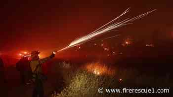 Wildfire scorches western states during heat wave