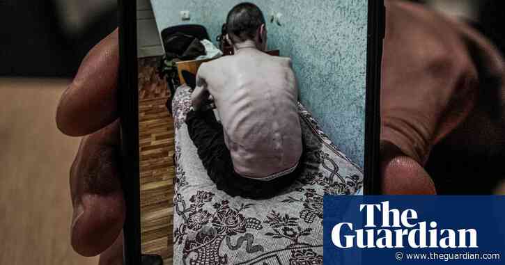 ‘One goal is to destroy Ukrainian identity’: the haunting images of Russia’s prisoners of war