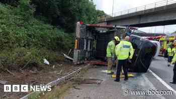 Lorry overturns on M6 causing long tailbacks