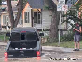 Burst water pipe in Saskatoon's City Park neighbourhood sinks truck, lifts asphalt