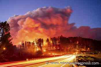 California’s largest wildfire explodes in size as fires rage across US West