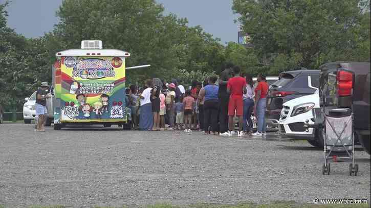 Church gives away 100 backpacks full of school supplies at back-to-school bash