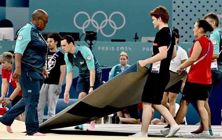 Photos: Preparing the field of play for the women’s gymnastics finals