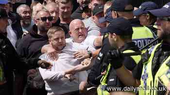 Profiting from chaos: Looters take advantage of riots to steal wine, phones and crocs as they ransack shops in Liverpool, Hull and Manchester as anarchy sweeps Britain, with police officers hospitalised by thugs and clashes between rival groups