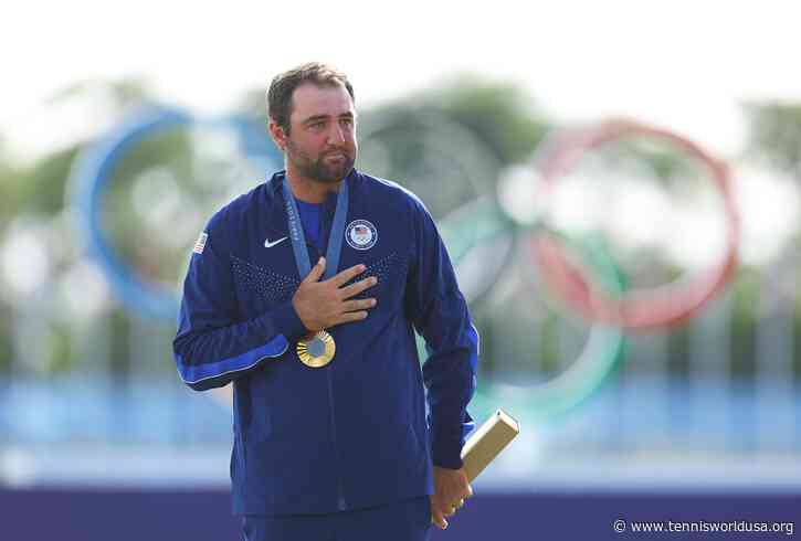 Scottie Scheffler cries after winning the gold medal in Paris