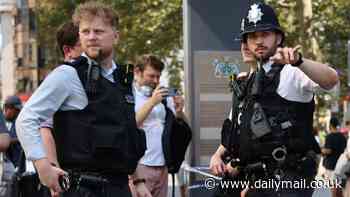 Schoolgirl, 11, and woman, 34, stabbed in London's busy Leicester Square and rushed to hospital as police arrest man