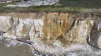 Cliff face collapses near caravan park in latest rockfall on Britain's crumbling coastline