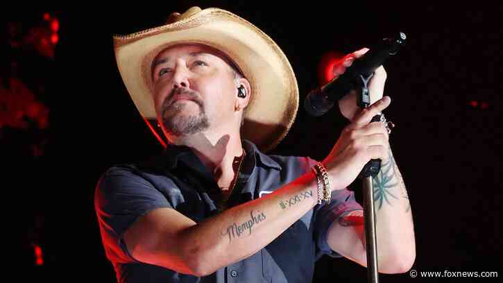 Jason Aldean reunites military family with onstage surprise