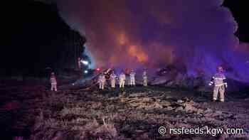 Pile of wood waste debris catches on fire in Sherwood