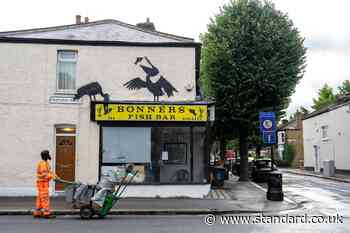 Fish shop owner was worried someone would break in after Banksy artwork appeared